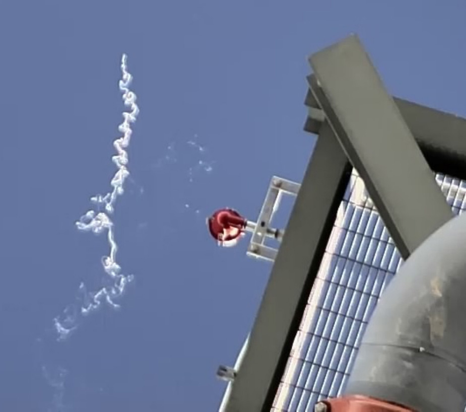 An insect leaves a smoke trail after being burned at the Ivanpah solar plant